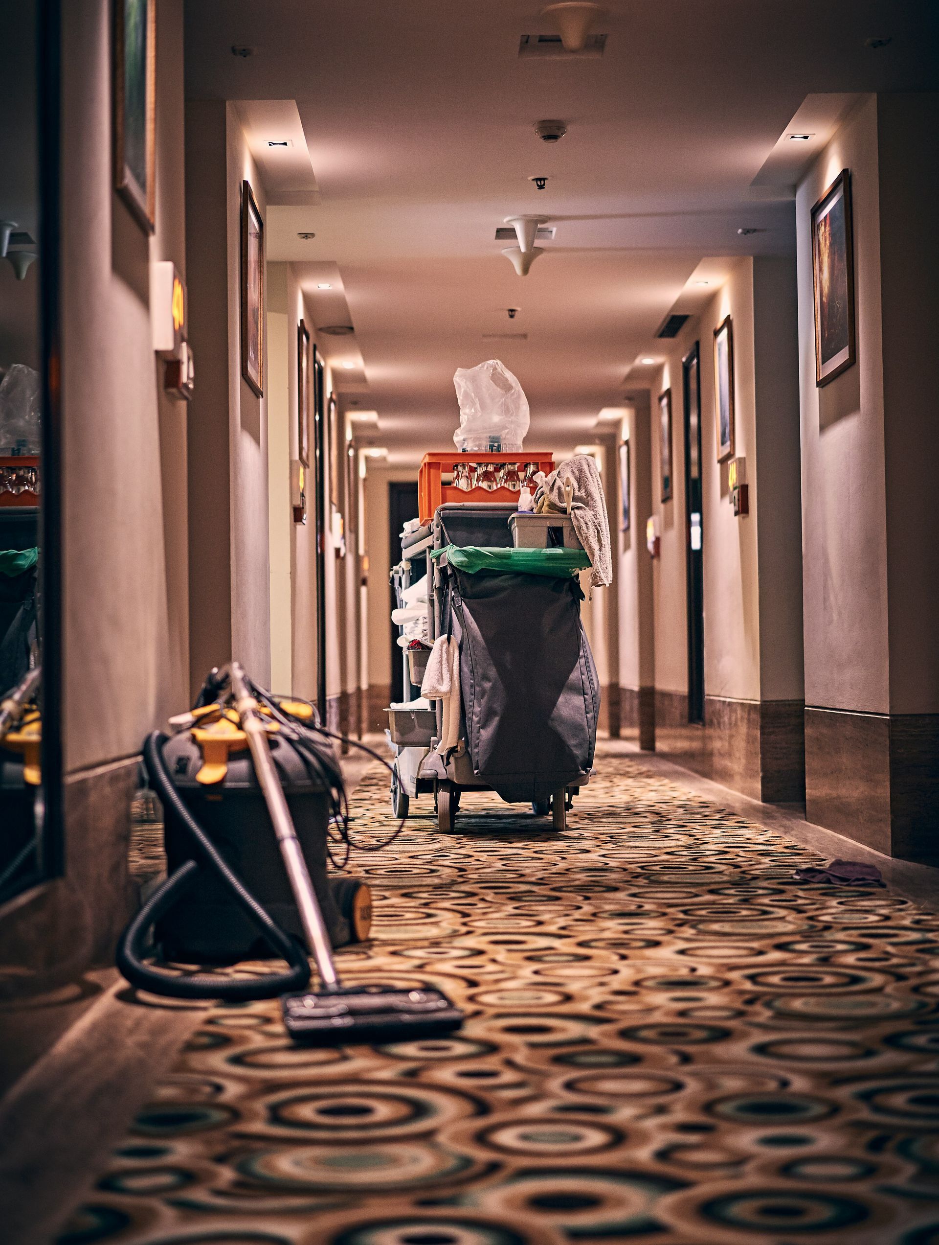 black and gray stroller on hallway